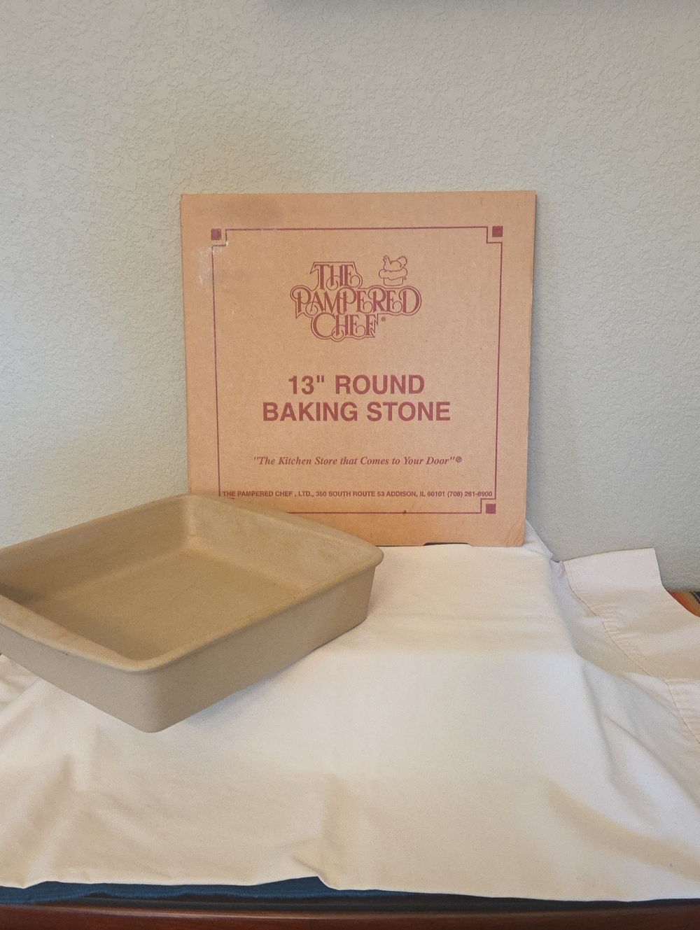 The Pampered Chef 13" Round Pizza Stone and Rectangular Stone Baking Pan